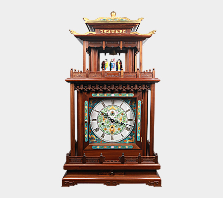 Clock with the decoration of Eight Immortals revolving in a pavilion